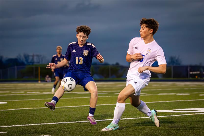 Students play soccer